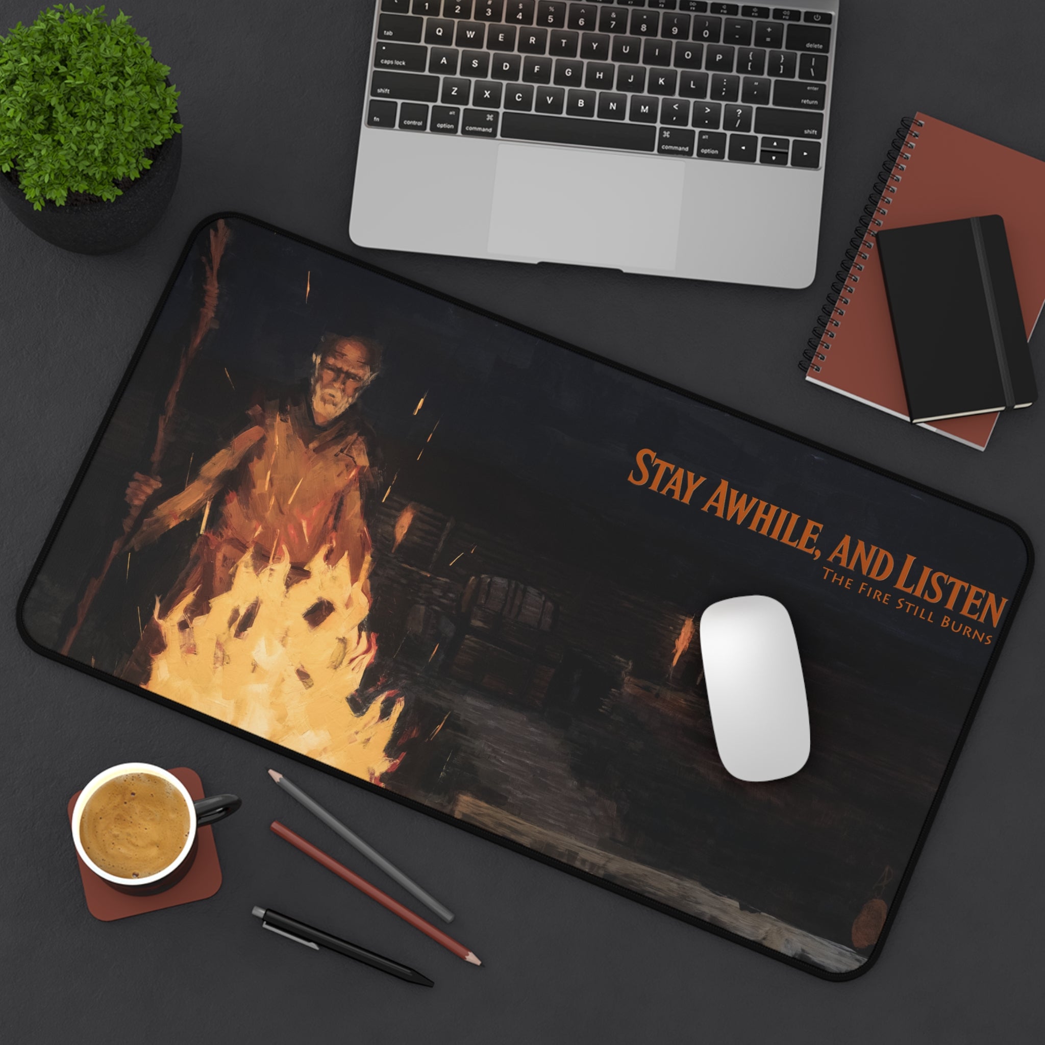 The Fire Still Burns — 12x22 Branded Desk Mat