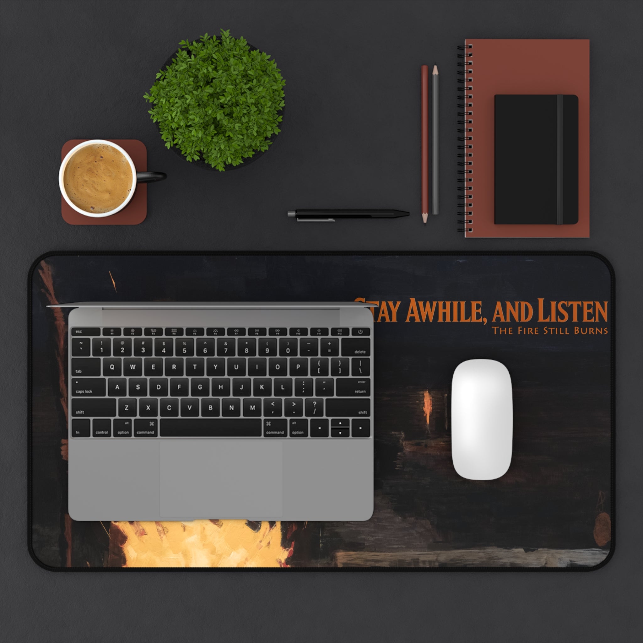 The Fire Still Burns — 12x22 Branded Desk Mat